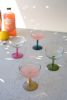SET OF FOUR COUPE GLASSES WITH COLORED STEMS - ONE EACH