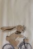 TEA TOWEL - EASTER RABBIT ON A BIKE
