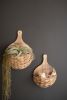 SET OF TWO TALL OVAL WOVEN SEAGRASS BASKETS